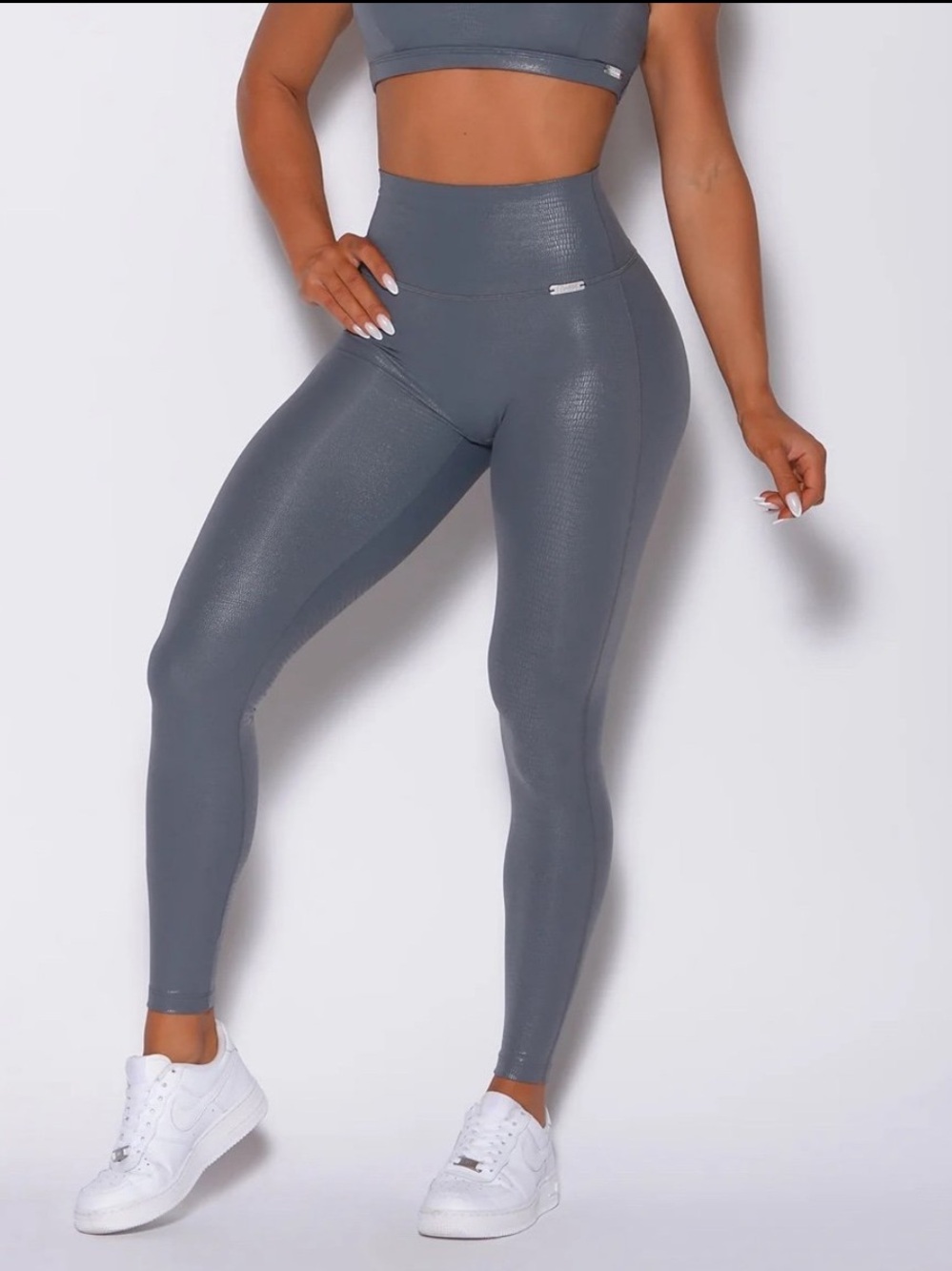 Bombshell Sportswear shiny python leggings Size Small with a 24” inseam